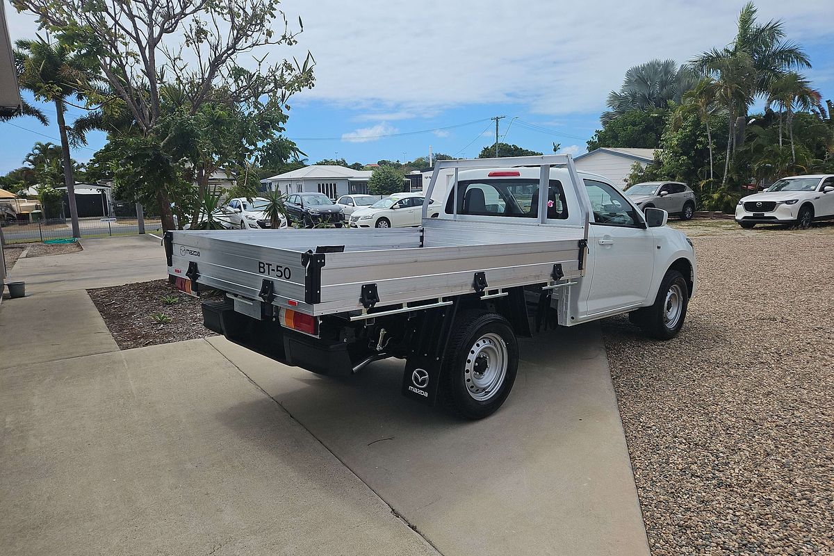 Example white Mazda BT-50 with an open tray back and no toolbox; not the actual Creekside Hire vehicle.